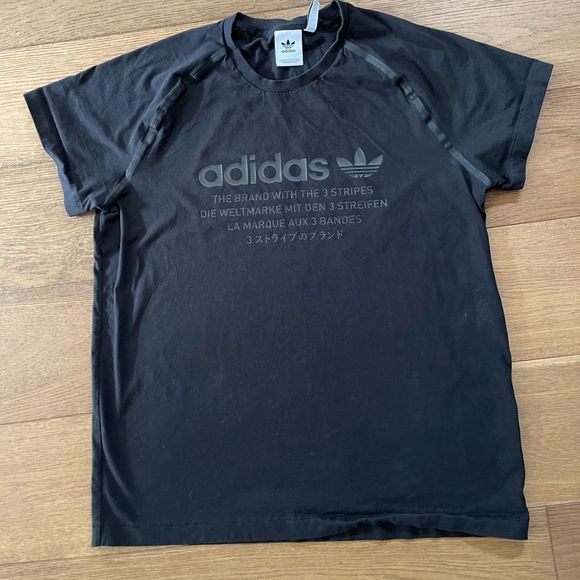 adidas Other - XL Adidas "The Brand With The 3 Stripes Die Marke Mit Den” T-shirt in Black
